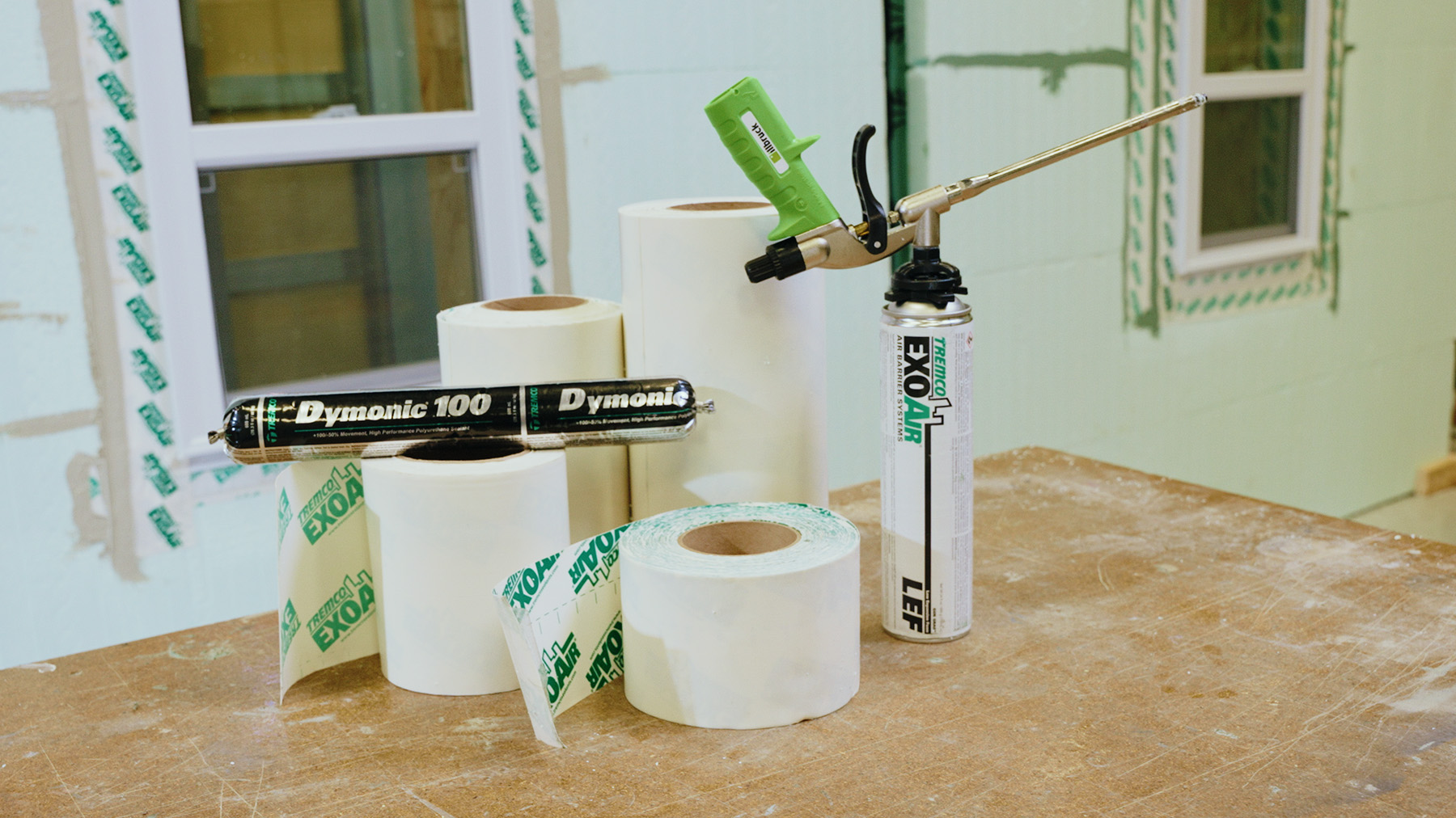 Collection of flashing products, including dymonic 100 sealant and air barrier