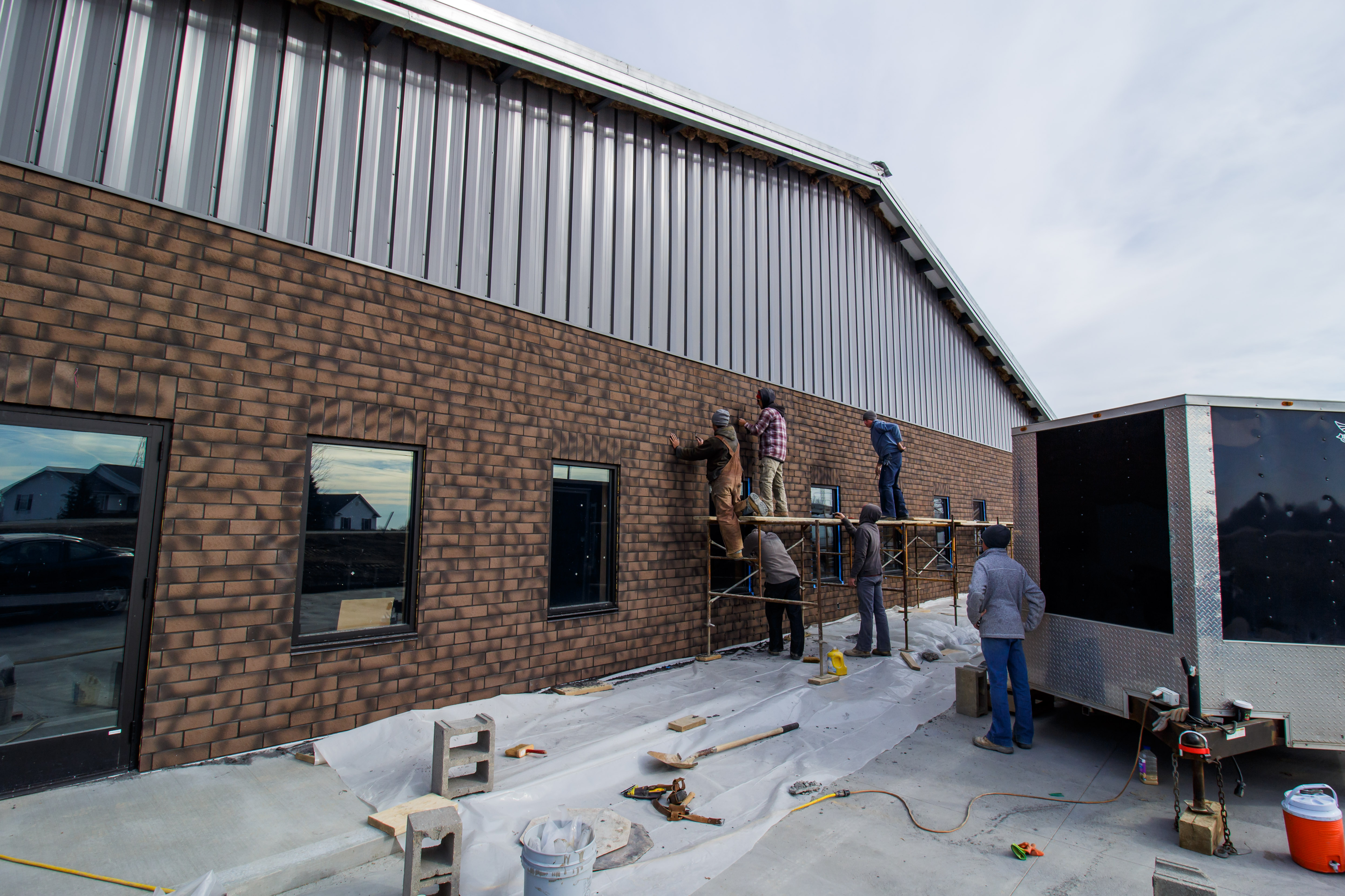 Finishworks plant with newbrick and metal exterior finishes