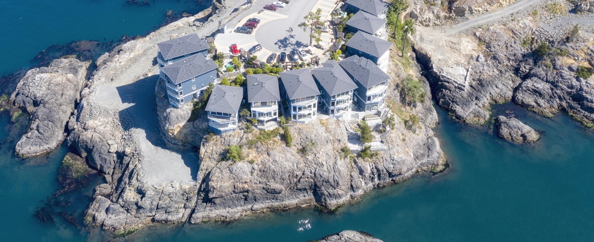 aerial view of waterfront condo buildings