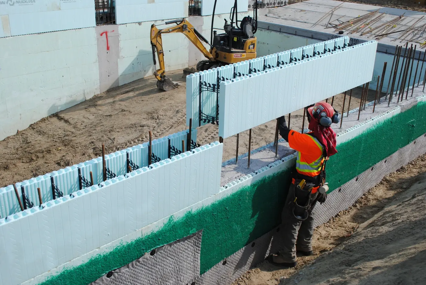 ICF form stacking on jobsite.
